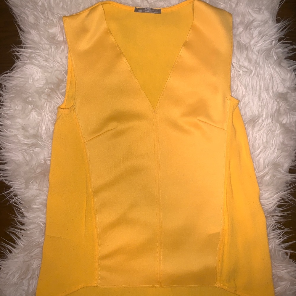 Zara yellow high low blouse.